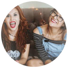 Two young women smiling
